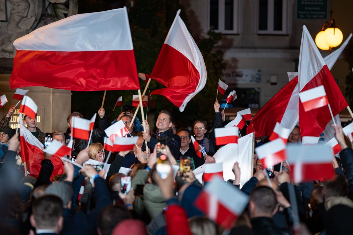 Centrist Warsaw Mayor Rafal Trzaskowski celebrating victory 
