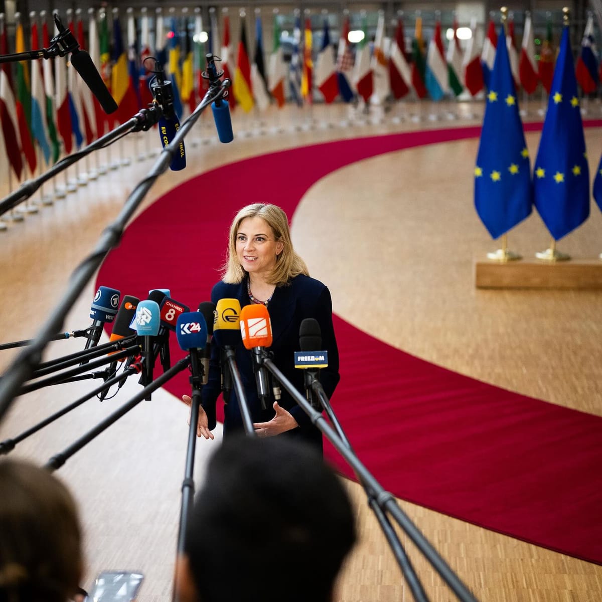 Austrian Foreign Minister Beate Meinl‑Reisinger speaks to members of the press