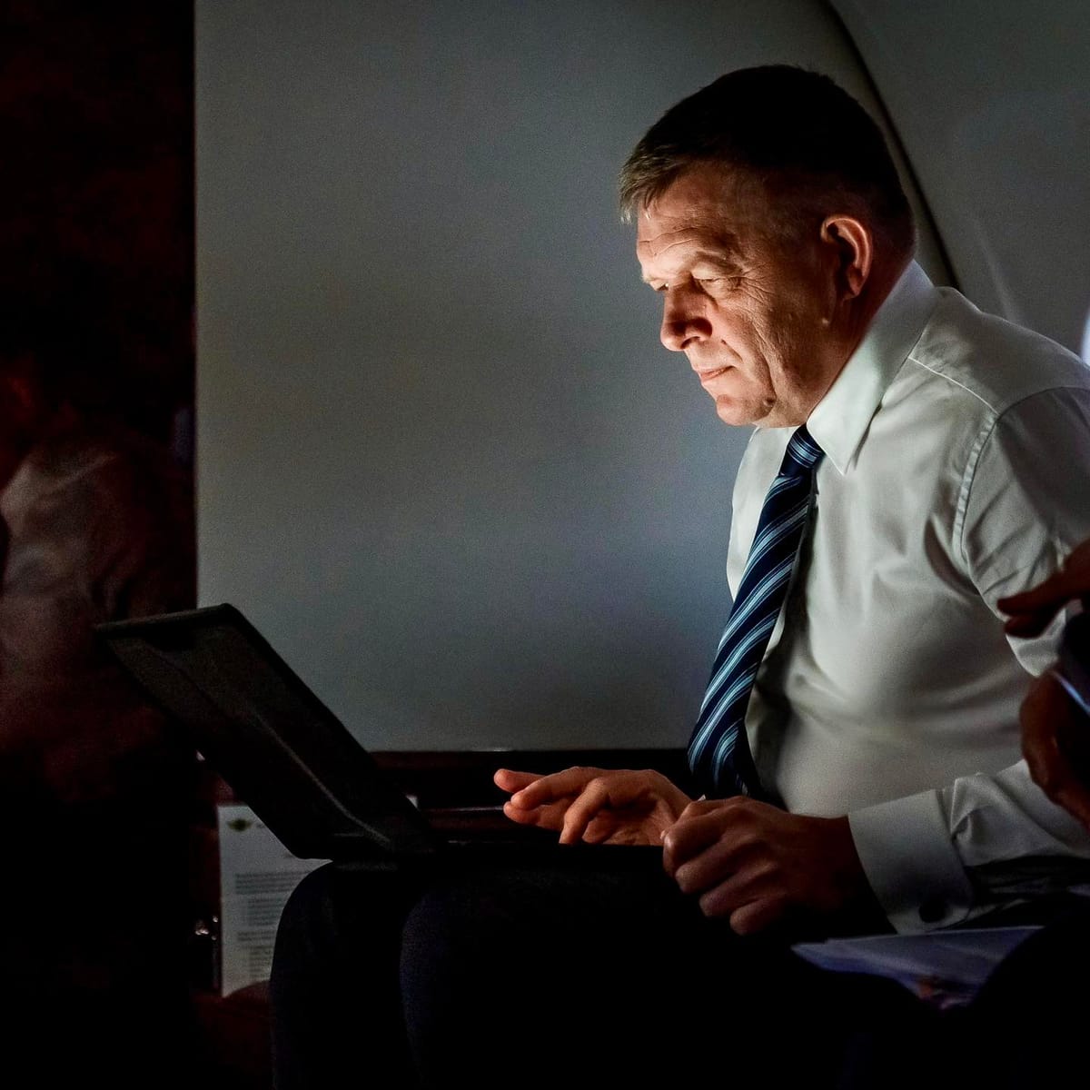 Slovak Prime Minister Robert Fico with laptop in July