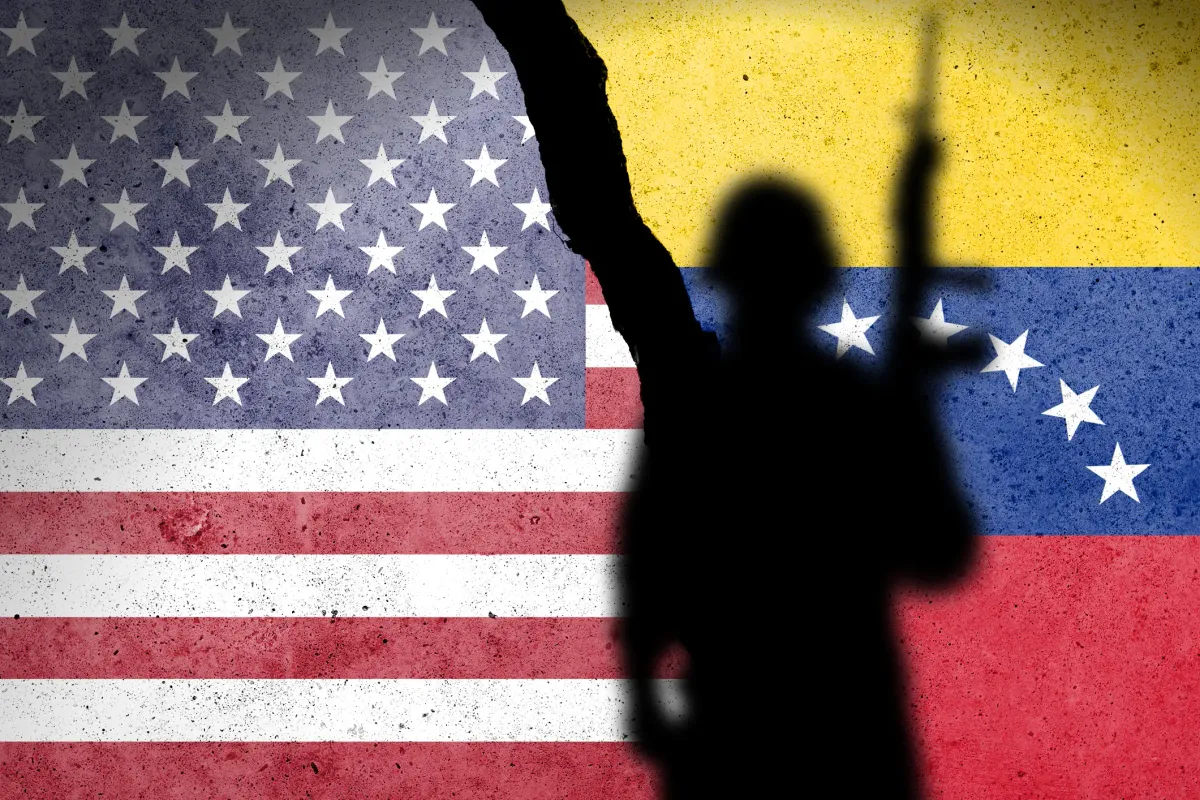 Shadow of a solider in front of the American and Venezuelan flag